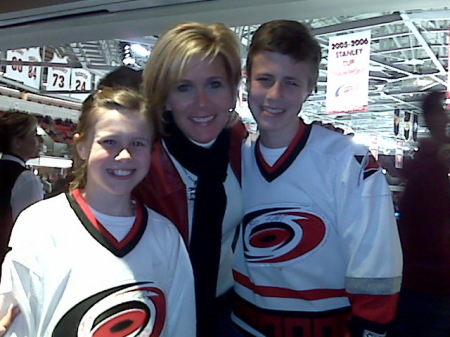 Kids and mom at a Hurricanes game