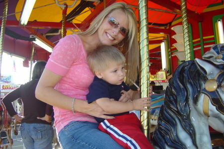 Avery's 1st carousel ride.