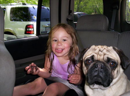 My Granddaughter Skyler and her pug Jackson