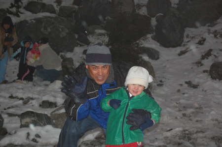 Christopher and Daddy playing in the snow.