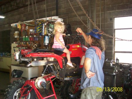 Kylie on papaw's toy