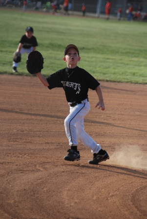 Preston catching a pop-up at shortstop