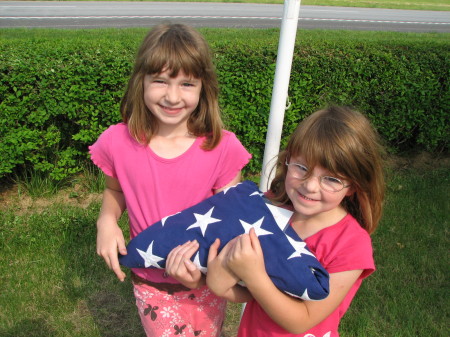 Holding Grandpa Yount's flag