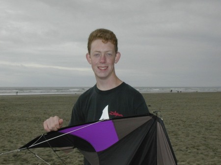 Chris with a kite at the Oregon shore