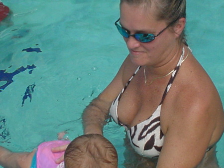 Courtney's first venture in the pool with mom