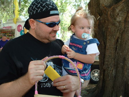 TIM AND OUR GRANDAUGHTER, CARA