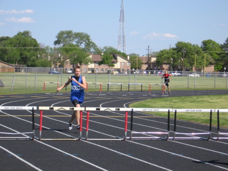 Aaron running hurdles
