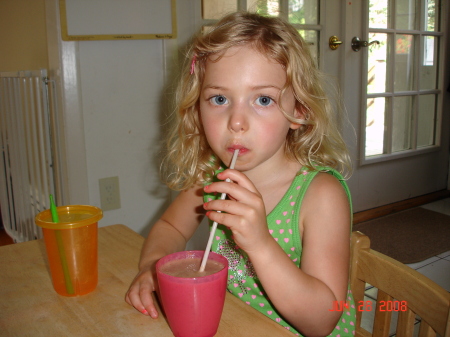 Emily drinking one of Grandma's smoothies