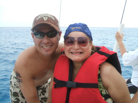 My son, Jorge Jr. and I, snorkling in Cozumel.