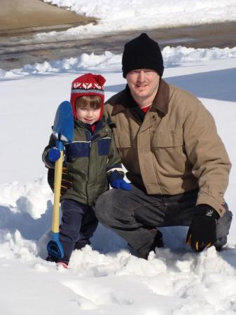 Daddy and Ian shoveling the snow