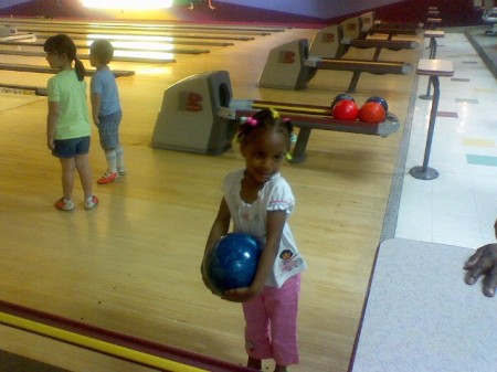 Aria bowling at her party