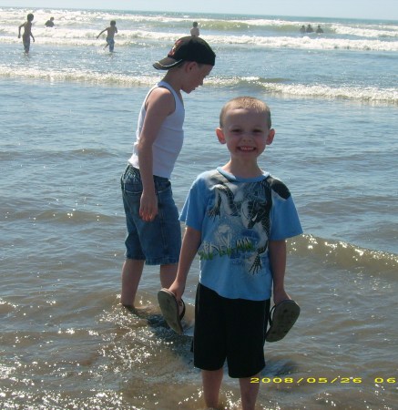 boys playing in the Ocean at SeaSide, OR