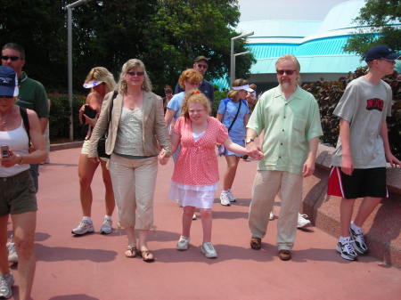 Ashley, Mom and Dad at EPCOT