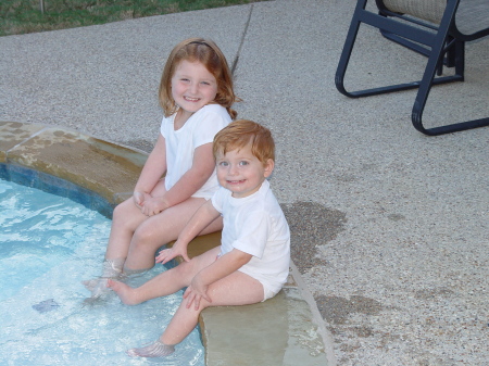 Sami and Christian in the backyard by the pool