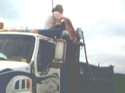 Hubby perched on top of our first truck