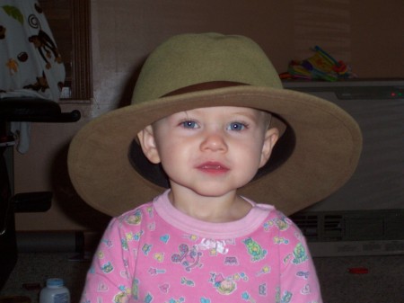 Wearing Daddy's Hat