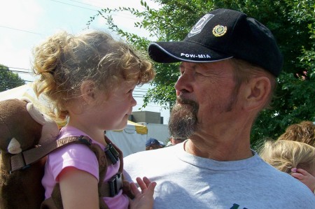 My grandbaby and me waiting to ride on Thomas the Tank Engine