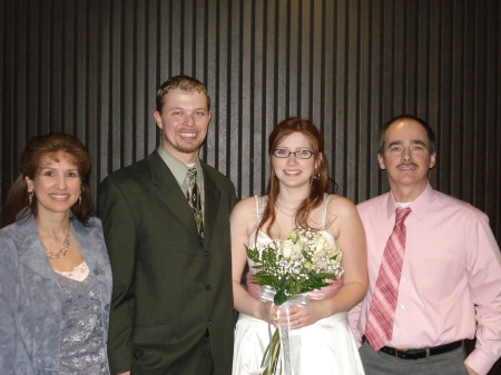 My wife, son-in-law, daughter, and me