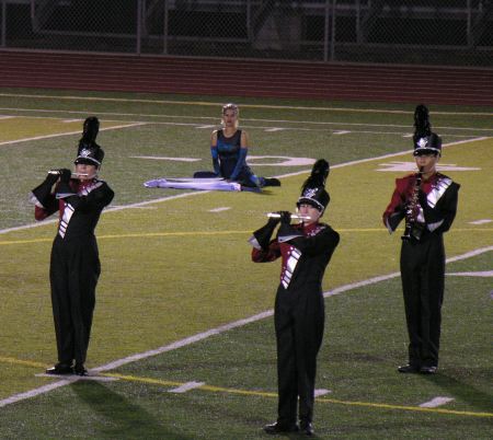 band clarinet, flutes, and color guard