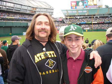 My Older son and I at a baseball game 2005.