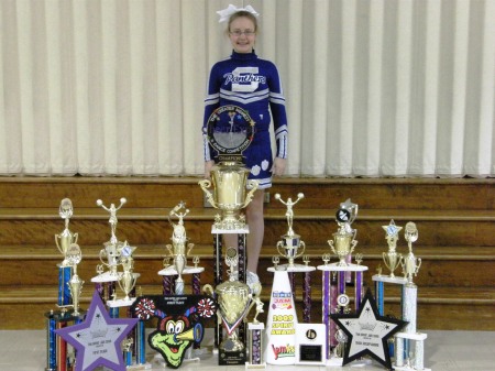 Lillian with 4 years of trophies