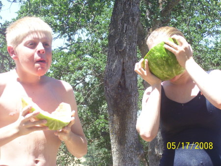Eating watermelon while camping