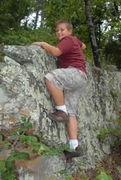 Devin rock climbing