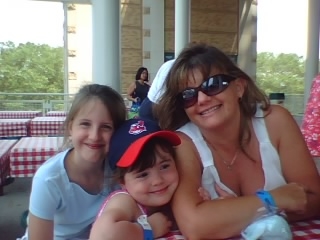 Me and the girls at a Tribe game.