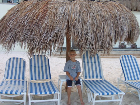 Youngest son taking it easy on the beach!