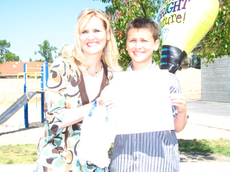 Kyle and me at his graduation from 6th grade