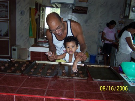 Son and Daddy baking together