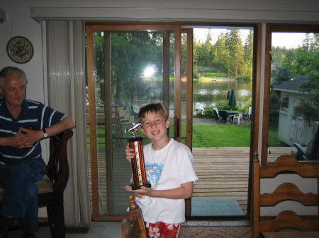 Son with fishing trophy