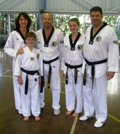 Me with my black belt family and instructor