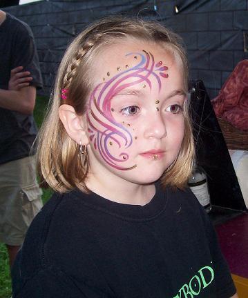 My daughter with her face painted!