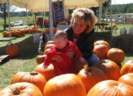 Olivia and Grandma, picking out a pumpkin