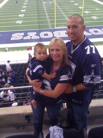 Daughter, son in law and grandson age 2 at Cowboys Stadium