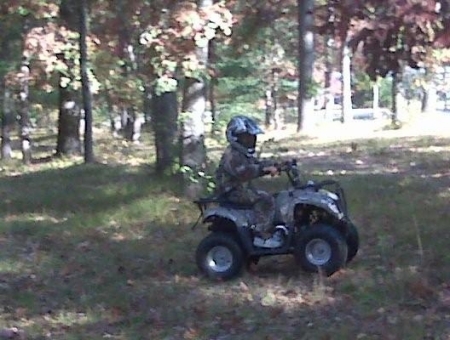 Nathan on his 4 wheeler in Mich