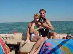 My wife, dog Roxy and I in the Saginaw Bay.