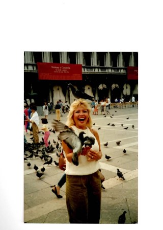 Playing with the Pigeons in Venice, Italy