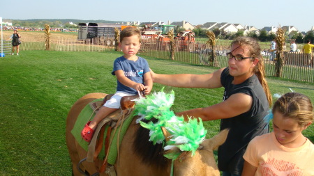 Trey riding the ponies