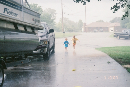 Playing in the rain at grandmas