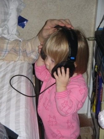 Elizabeth listens to daddy's music