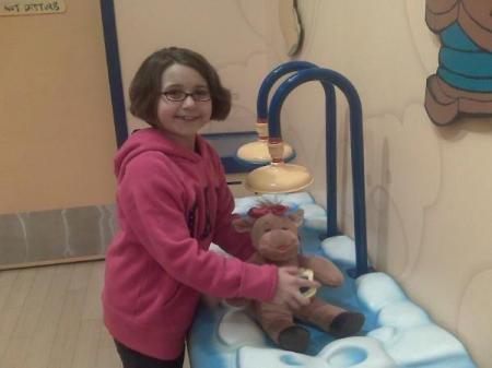 Bailee at Build a Bear...she can't get enough