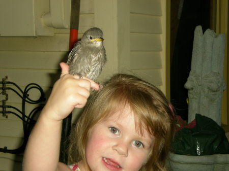 Daughter Jade with baby birds we found