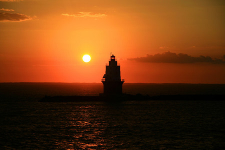 SUNSET AT THE BREAKWATERS