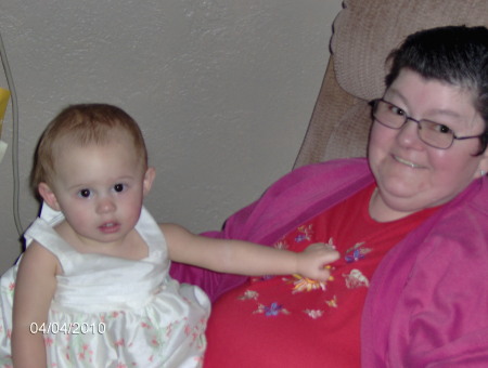 my mom holding her granddaughter