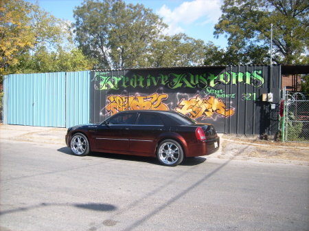 My pimp car in front of my shop