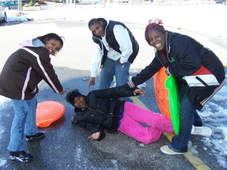 My girls snow boarding