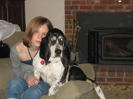 Our new dog Abby sitting with Kayleigh