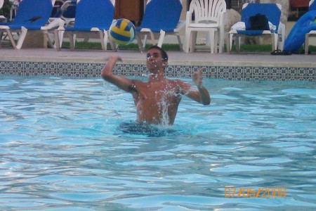 Cancun, Kyle playing volleyball